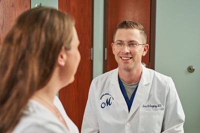 Moreland OB-GYN doctor, Dr. Gregory, with a patient in Watertown.