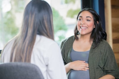 A D.O. providing a pregnancy planning and pregnancy care to her patient.