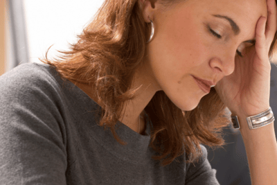 Woman stressed in midlife