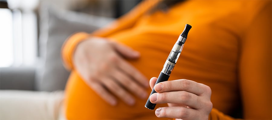 Pregnant Woman Smoking E Cigarette