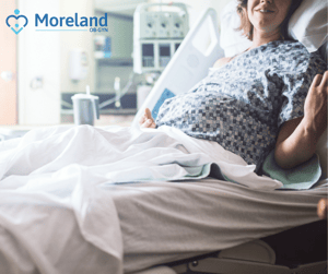 Pregnant Woman in Hospital Bed Ready for Labor