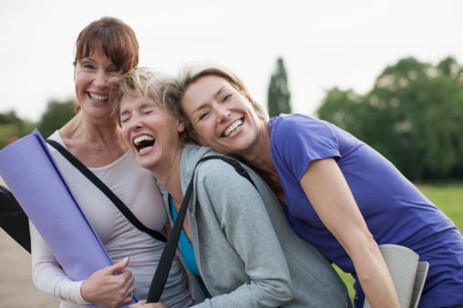 three women going to yoga together